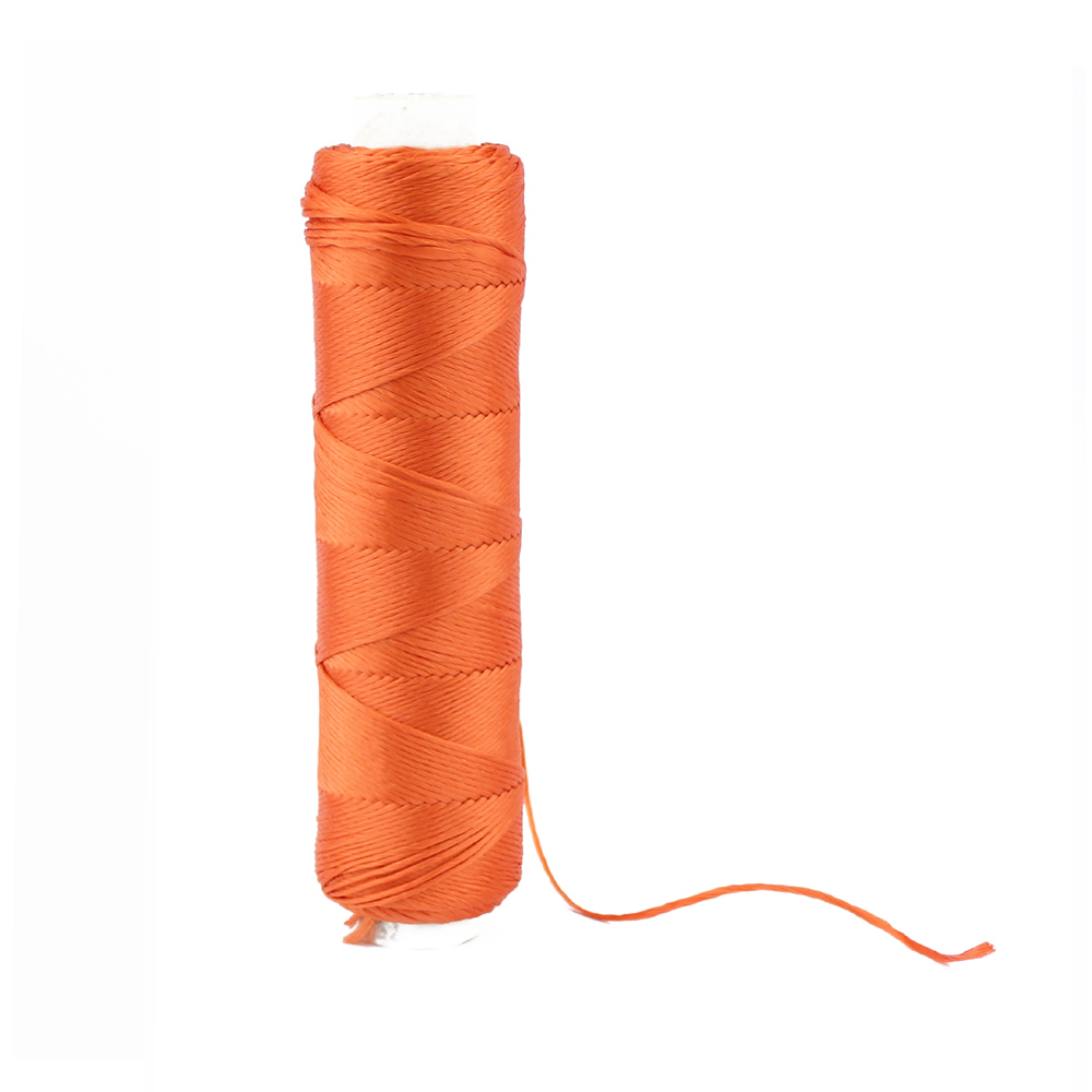 bobine fil soie orange brule